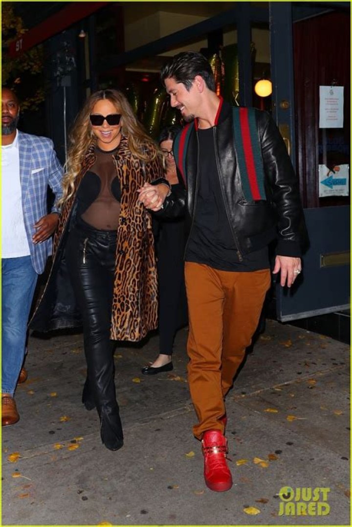 bitchy | Mariah Carey Leaving Gucci Store with Bryan Tanaka in Aspen