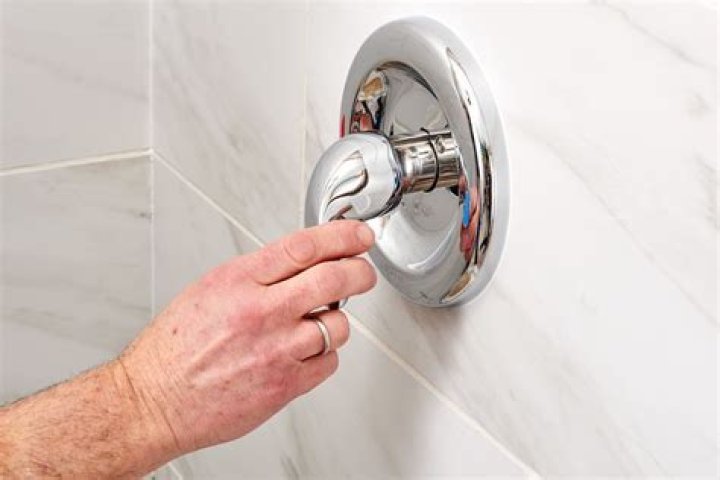 How do you replace a push pull shower faucet?