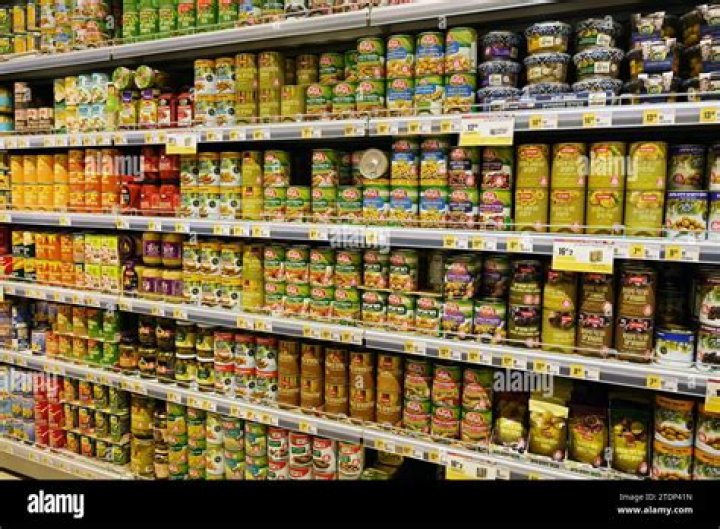 Is it safe to store unopened canned food in the fridge?