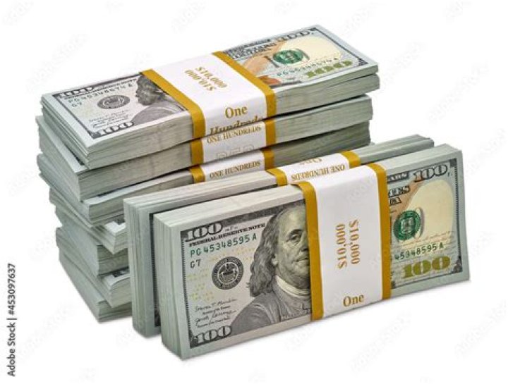 Shatta Wale’s bouncers protect him as a rich man sprays bundles of Dollars on him